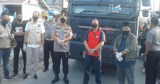 Polres Batu Bara Lakukan Penyemprotan Disinfektan Skala Besar