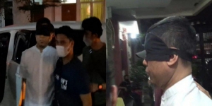 Penampakan Munarman FPI Tiba di Polda Metro Jaya, Mata Ditutup Tangan Diborgol